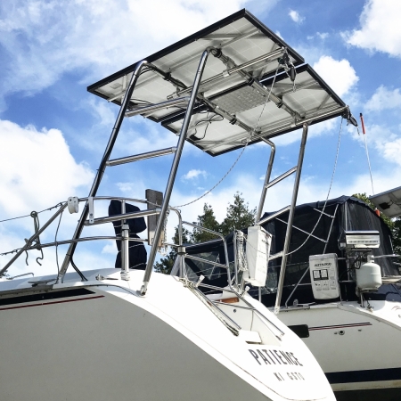 Stainless Steel Arch with Solar Mounts. Pinched in at Stern, Aft Legs mounted on Transom